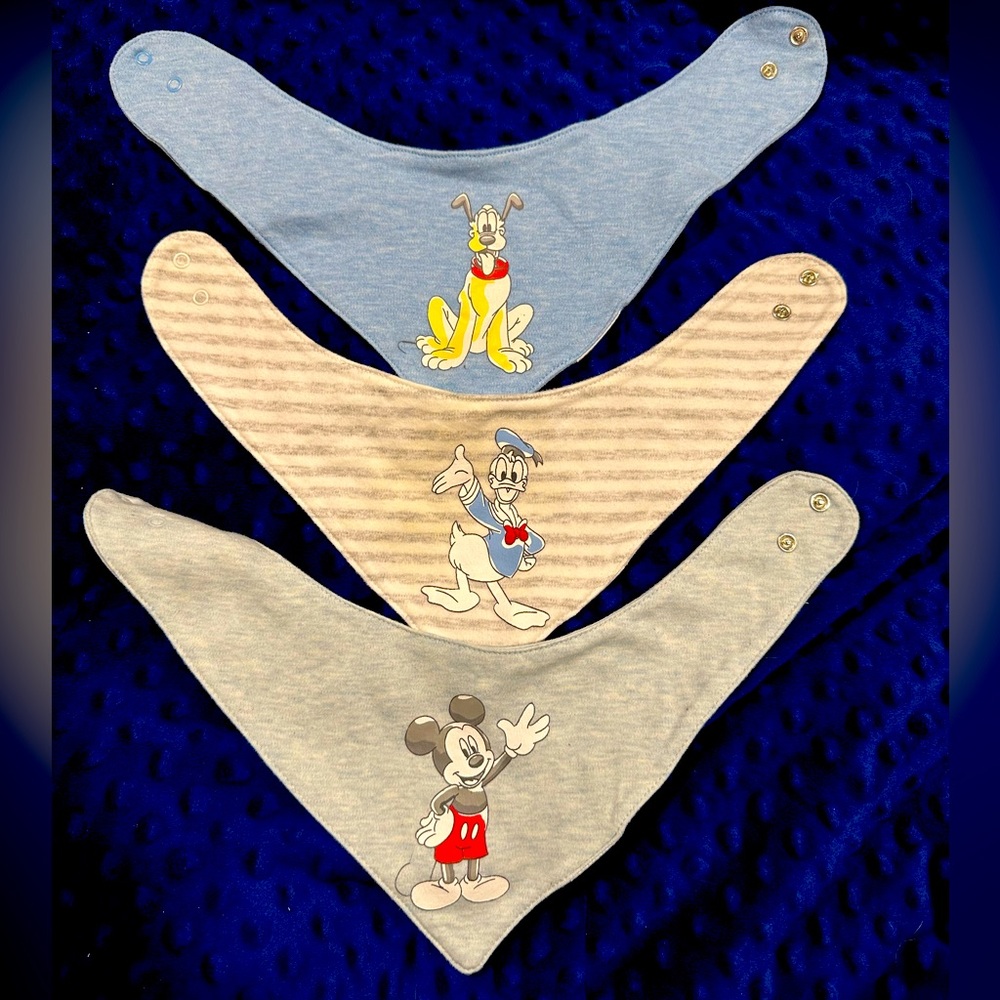 3 Disney Baby handkerchief bibs. Snap closure